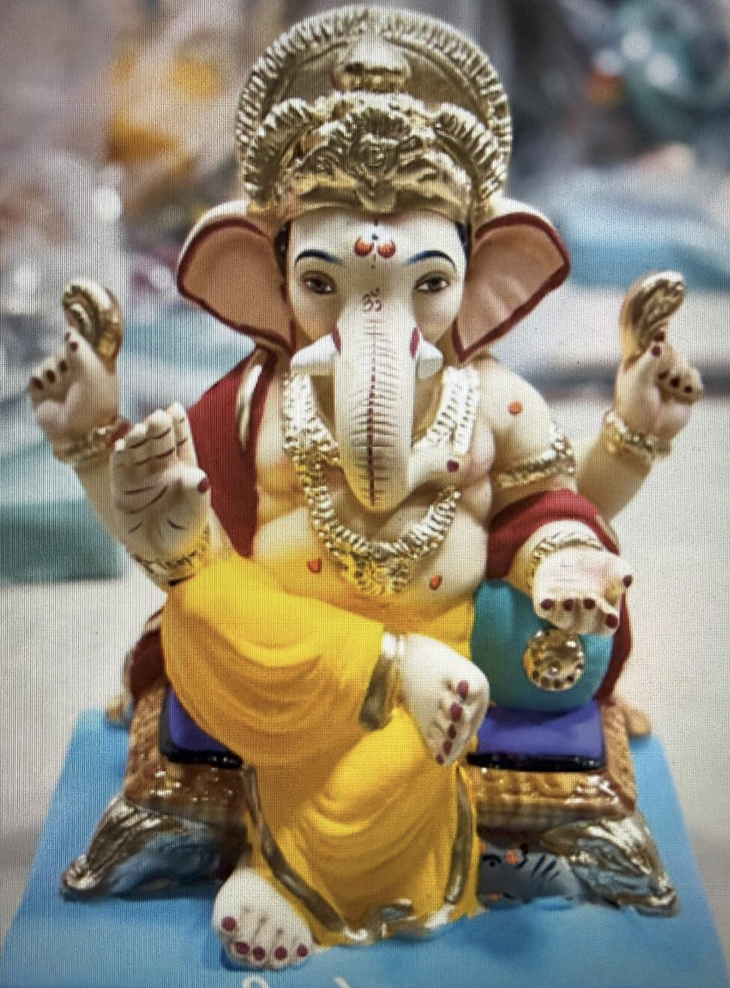 Ganesha on couch with load