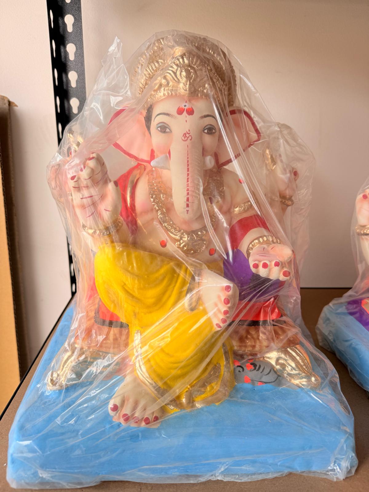 Ganesha On Couch With Load 13 inch 2