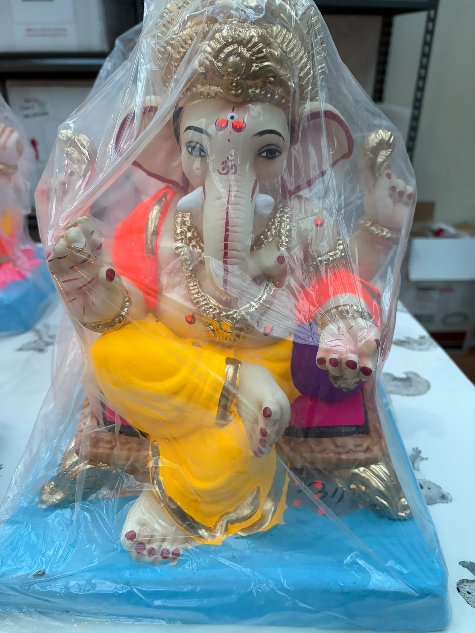 Ganesha On Couch With Load 13 inch 3